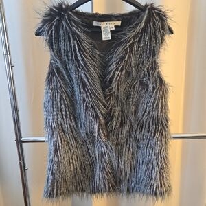Max Studio Faux Fur Vest. Hook Closure. Polyester Lining. Dry Clean Only.